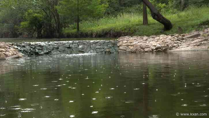 What washes into Austin waterways after heavy rain?