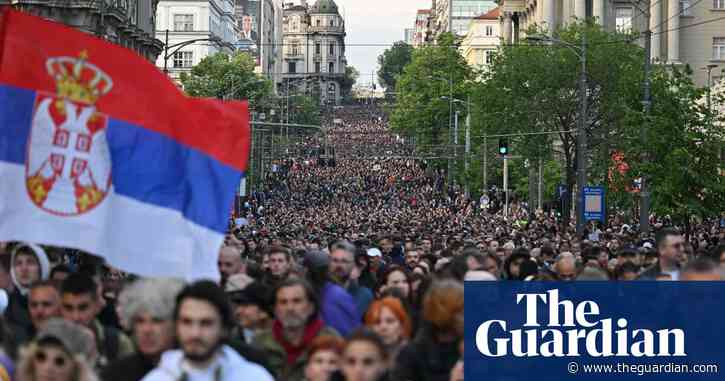 Tens of thousands march in Belgrade after mass shootings
