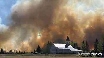 Albertans advised to watch for symptoms of smoke inhalation, as wildfires worsen air quality