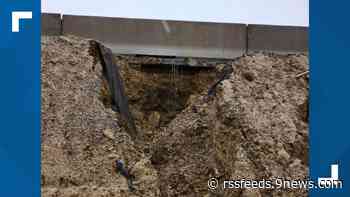 Emergency work stabilizes washed-out slope under I-25