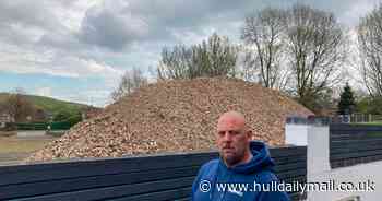 Family misery as mountain of bricks next door blocks view for last year