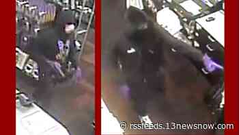Police in Suffolk searching for two men who robbed store at gunpoint