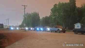 Residents of Chateh, Alta., flee their homes again as fire encroaches