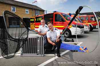 Einsatzfahrzeug mit Käscher und Fangschlinge