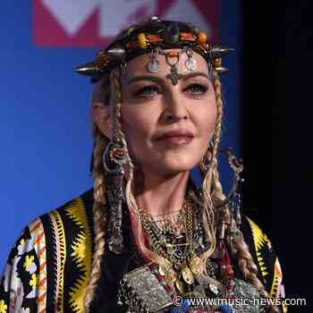 Madonna admits she initially 'rejected the idea' of having children