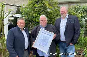 Goldene Ehrennadel für Andreas Büscher