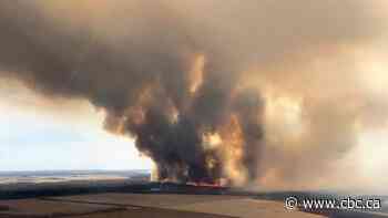 Alberta oil and gas companies stop some production again as wildfires worsen