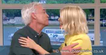 This Morning's Phillip Schofield and Holly Willoughby share hug live on air as she leaves show