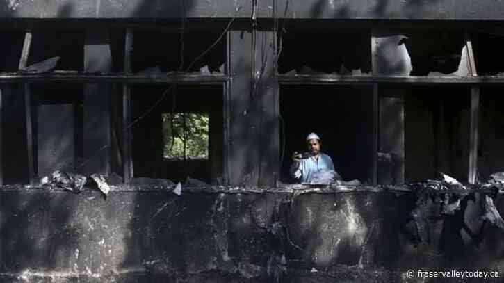 Former Pakistani premier Imran Khan says police are surrounding his home