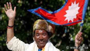 Nepalese mountain guide sets Everest record with 27th ascent