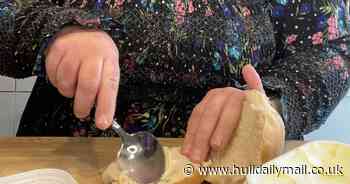 Mum sparks controversy as she butters a bread roll with a spoon