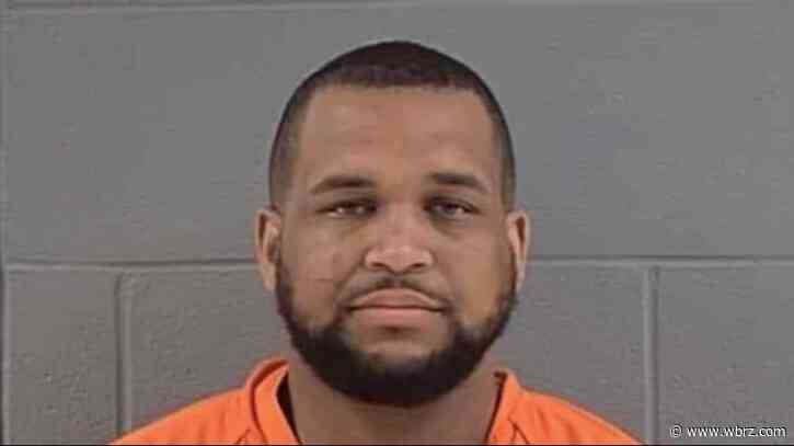 St. Gabriel police officer formally charged with murdering man at estranged wife's home