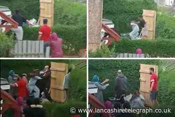 Arrests after woman punched and kicked in Accrington