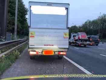Lancashire driver caught texting while driving by police