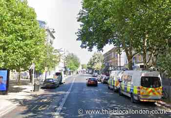 Stoke Newington High Street shut after police vehicle hits man