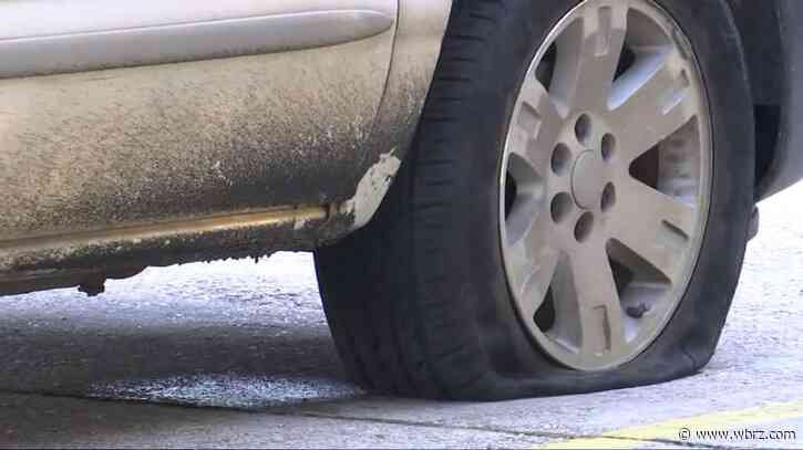 Mystery debris damaged roughly a dozen cars on busy I-10 exit ramp Friday morning