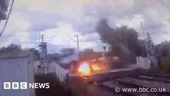 Lorry hits power lines at Essex railway crossing