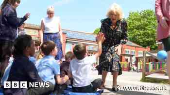Queen Camilla gives Bristol boy high five in first solo outing