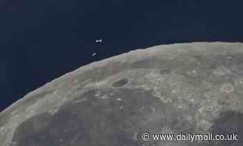 UFOs are spotted flying on dark side of the Moon in video recorded in broad daylight