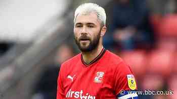 Charlie Austin & Jonny Williams: Striker to stay with Swindon as midfielder among eight leaving