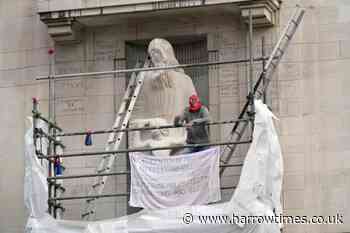 BBC HQ statue attacked by a man wearing Spiderman mask