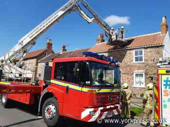 Crews called to tackle roof fire in village near York