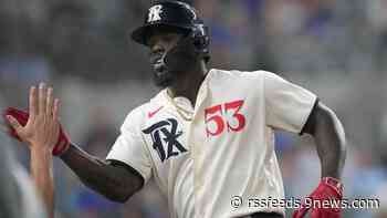 Garcia goes deep again as Rangers roll past Rockies 7-2