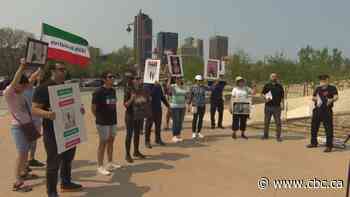 Manitoba's Iranian community rallies outside of Human Rights museum after latest executions