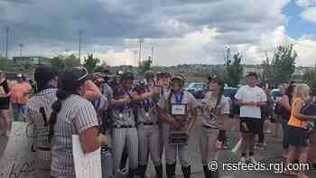 Douglas softball players celebrate after winning the statetitle