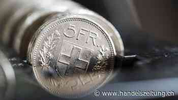 Franken steigt zu Euro und Dollar