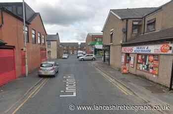 Blackburn men arrested after driver attacked with weapons