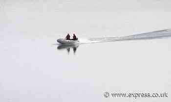 Madeleine McCann divers pictured on the water as new reservoir search commences