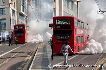 West Croydon Bus Station: White smoke comes from 407 bus