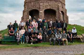 Team from Hakim Group walk to the tower for Mental Health Week