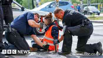 German police raid climate activists who blocked traffic