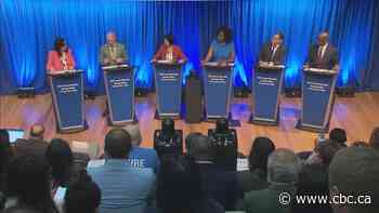 Top mayoral candidates launch attacks over taxes at housing debate