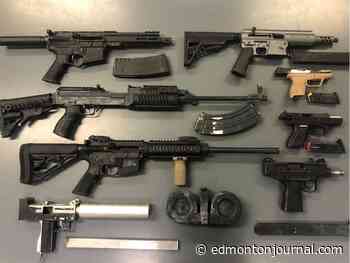 Edmonton police gang unit arrests two for restaurant attack, eight guns seized