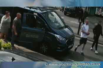 Epsom Pound Lane: Hunt for group after street fight