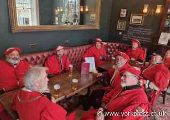 York Guard celebrate the new Lord Mayor with a pint at Harkers