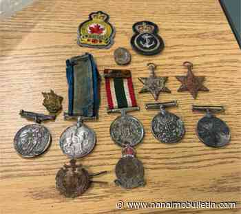 Teen pulls box of war medals out of Abbotsford river while fishing