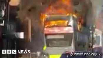 Top deck of Birmingham bus destroyed in suspected arson attack
