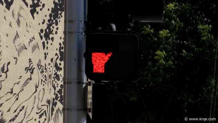 Vandals alter Albuquerque pedestrian crosswalk signals to give the middle finger