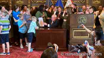 Gov. Walz signs paid family and medical leave act