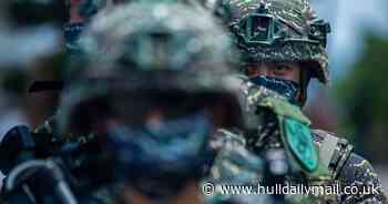 Taiwan on alert after huge Chinese warships add pressure on self-ruled island