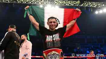 Lopez floors Conlan, retains featherweight title