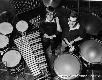 Orchestra musicians play percussion at Oxford Town Hall