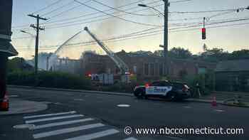 Crews Continue to Extinguish Hot Spots After Fire at Abandoned Waterbury Factory