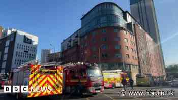Fire crews rescue 12 people from Birmingham high-rise blaze