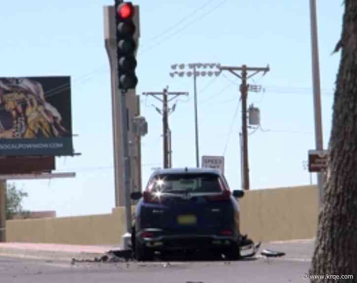 Albuquerque motorcycle, vehicle crash hospitalizes 1