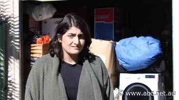 Haya shares a room with her partner and two children. Her family can't afford to rent a house